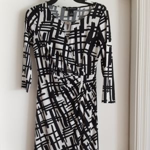 Inc size medium black and white faux wrap dress.